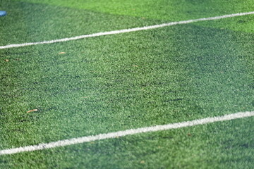 Obraz premium artificial green grass background for playground