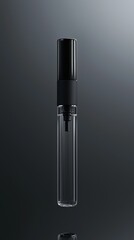 Obraz premium A sleek black spray bottle on a reflective surface, perfect for product photography.