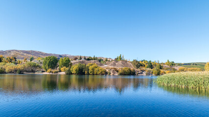 Fototapeta premium Aerial perspective of the Cromwell gorge and Bannockburn area in Autumn
