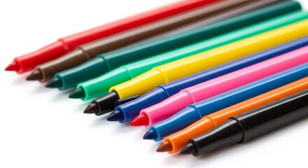 Fototapeta premium Colorful felt tip pens arranged in a row perfect for creative projects and vibrant illustrations ideal for school art and design projects