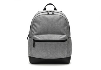 A gray backpack with black accents and zippers isolated on a white background in a studio setting