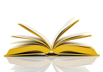 An open book with yellow pages and cover sitting on a reflective surface against a white background