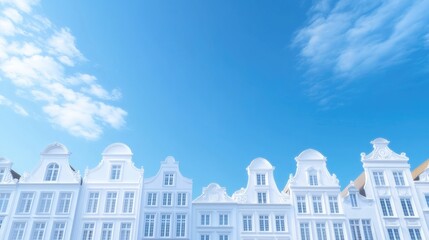 Fototapeta premium White historical buildings under a vibrant blue sky. Rows of charming, classic European architecture