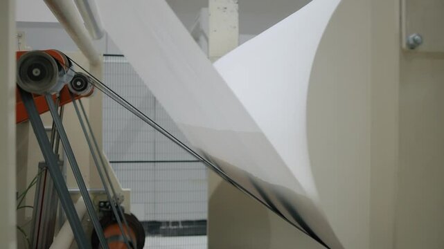 Conveyor line at paper mill. Modern toilet paper production. Production of napkins