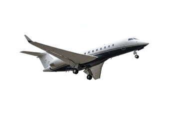 Obraz premium A private jet with landing gear extended is shown against a bright white background in mid flight