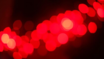 Abstract red bokeh lights, blurred festive glow on black backdrop, romantic, red