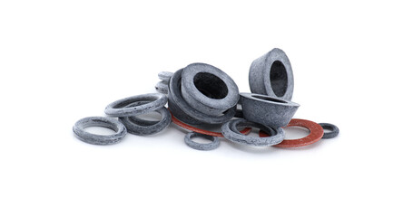 Various rubber gaskets and seals are stacked on a white background, perfect for industrial use.