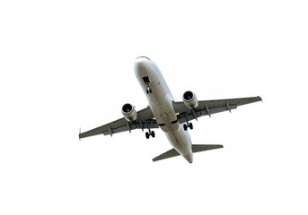 Obraz premium Underside view of a passenger airplane with landing gear extended against a clear white sky background