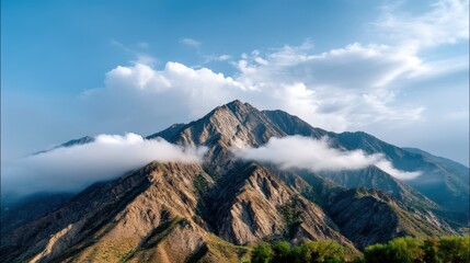 Majestic mountain peaks under a blue sky.