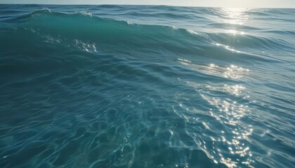Fototapeta premium Azure ocean surface, sunlit ripples reveal vibrant underwater scene Waves gently caress the shore , clouds, texture