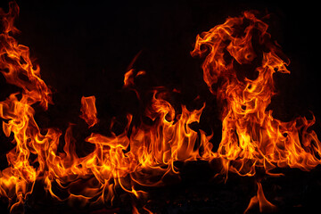 Fire blaze flames on black background. Fire burn flame isolated, abstract texture. Flaming explosion with burning effect. Fire wallpaper, abstract art pattern.
