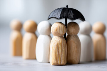Team protection and life insurance concept symbolizing business safety, human resources care, and workplace security