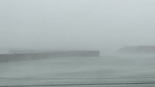 Sheets Of Rain Sweet Across Harbor As Hurricane Makes Landfall - Khanun