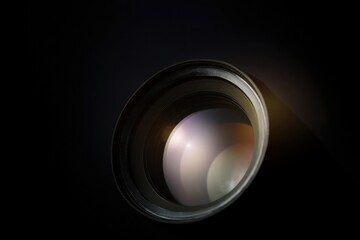 close-up of telescope lens against minimalistic dark background