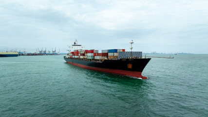 container ship carrying goods for international import export, business and industry regarding...