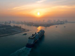 luxury transportation, large cruise ship docked at pier in the norming over the sunlight backgrounds