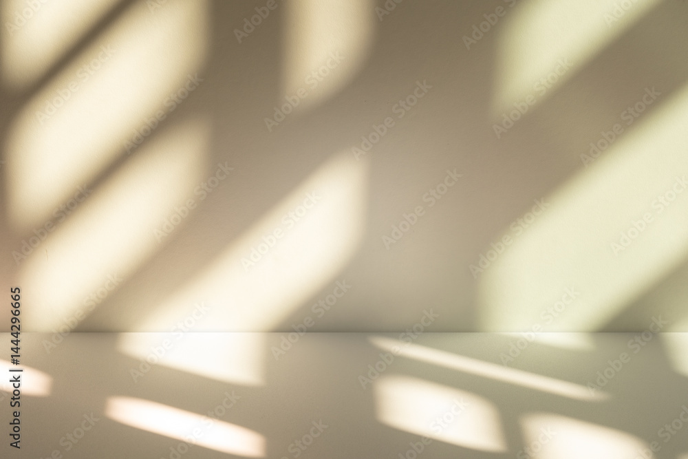 Fototapete Wall interior background, studio and backdrops show products. with leaf shadow from window color beige and white. background for text insertion and presentation of product	
