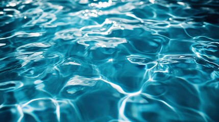 Obraz premium Abstract Blue Water Texture Ripples and Reflections