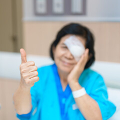 Elderly Woman with eye protective shield after eye surgery. Eye disease, Cataract,  Glaucoma, Age...