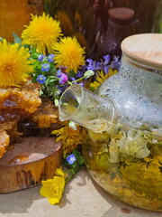 Glass jar full of honey wiGlass jar full of honey with honeycombs at the dachath honeycombs at the dacha