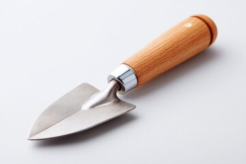 Fototapeta premium single garden trowel isolated against white backdrop