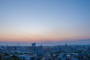 大分市の夜明けと朝焼けの空