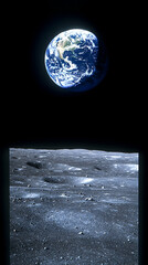 Earth seen above a lunar surface Craters rocks and dust make up the foreground