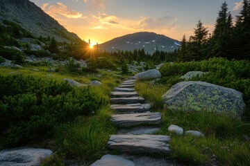 Mountain path at sunset, leading into a sunlit peak, amidst lush greenery and rocky terrain