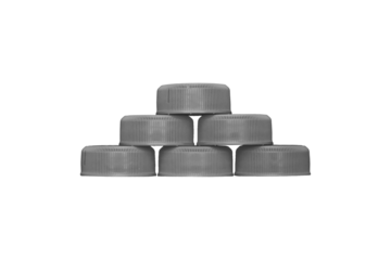 Set of six gray plastic bottle caps stacked in a pyramid is isolated.