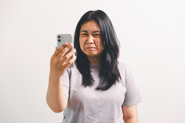 Asian girl expresses dislike, person express negative feeling, concept business complaint from...