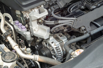 closeup view of car engine revealing complex components and intricate design in a well-maintained vehicle