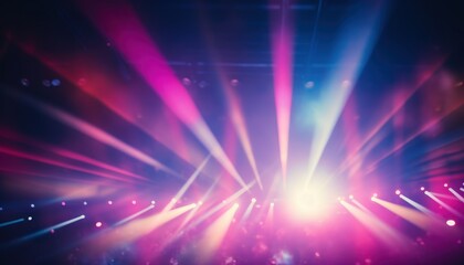 Colorful stage lights illuminating a crowd during a vibrant music concert at night