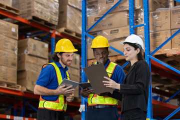 women supervisor recommend inspection and placement of goods to staff. Warehouse workers multi-ethnic discussing work checking inventory and consulting distribution product at storage department.
