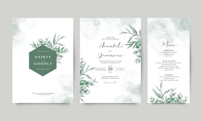 Elegant wedding invitation card set arranged with natural leaves decoration