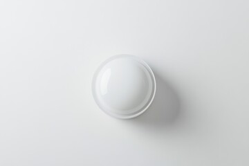 White circular ceiling light fixture featuring a rounded, dome-shaped shade and mounted flush against a plain white ceiling.