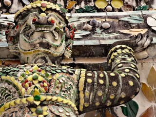 Fototapeta premium Thai Temple Guardian with Intricate Mosaic Details