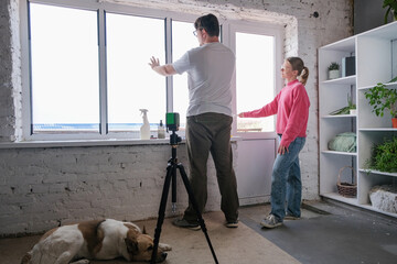 a couple toning windows glass at home using toning film