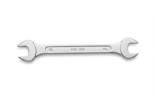A silver colored open end wrench with markings on a stark white background in a centered position