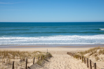sandy pathway dunes sand access sea atlantic ocean beach in grand crohot  in lege cap-ferret France