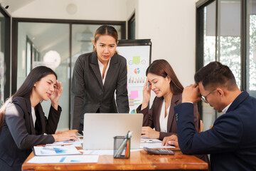 Group of business people are having a presentation meeting in an office room.