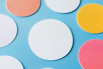 Colorful circular coasters arranged on a blue background, ideal for home decor or dining settings