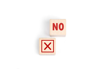 Wooden blocks show right and wrong signs, ideas, decisions, votes and yes or no. Business options...