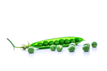 Fresh green peas in an open pod with scattered peas on a white background.