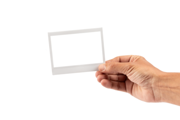 Male hand holding an instant picture photograph frame isolated no background