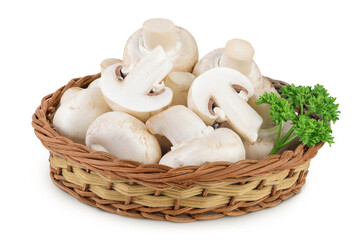 Fresh mushroom champignon in a wicker basket isolated on white background