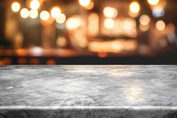 Gray stone countertop in a blurred background of a warm-lit bar