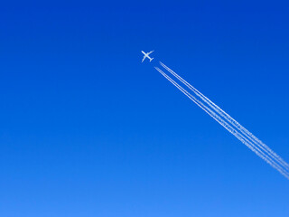 empty blue sky fading from white on the horizon to dark blue
