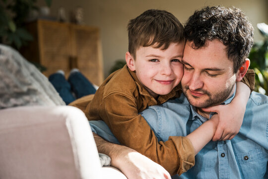 Father and son enjoying quality time together at home
