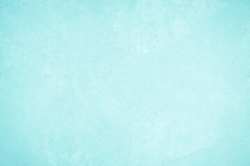 Pastel blue and white concrete stone texture for background in summer wallpaper. Cement and sand wall of tone vintage. Concrete abstract wall of light cyan color, cement texture mint green for design.