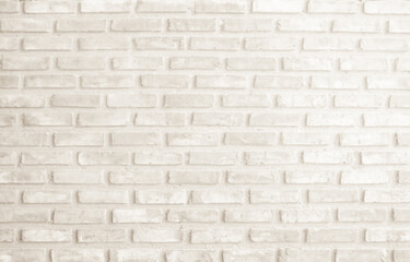 Detail of modern cream brick wall background photo. Brown light brick wall texture background for stone tile block painted in yellow light color wallpaper modern interior and exterior backdrop design.
